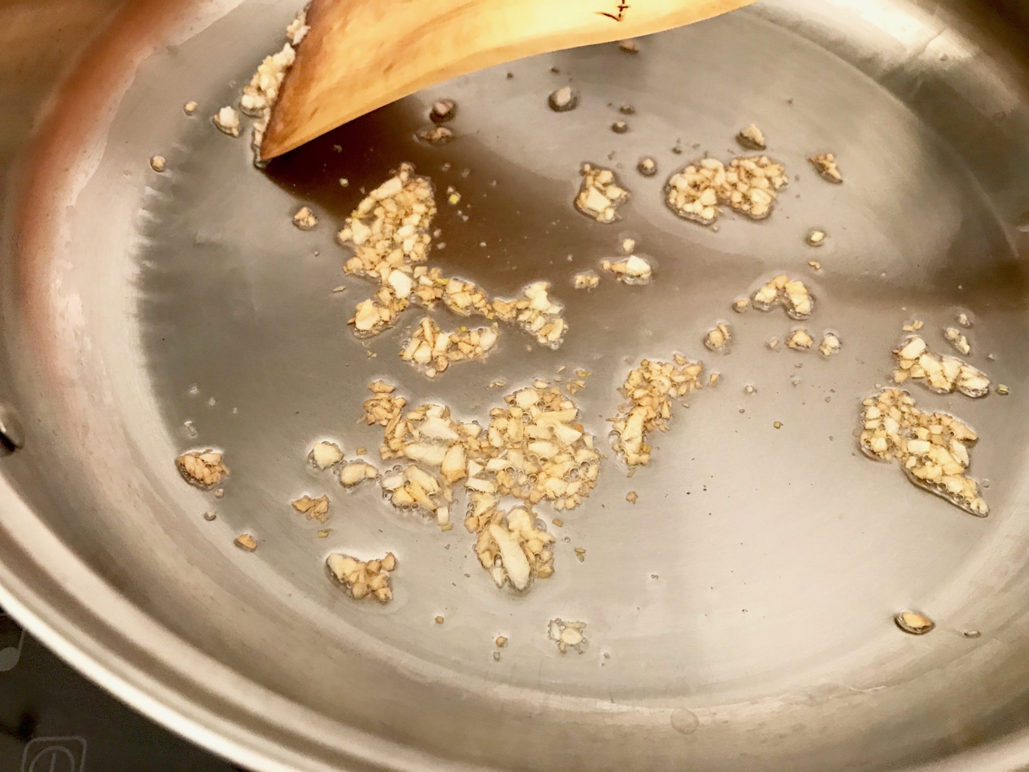 fry garlic 'til crispy gold
