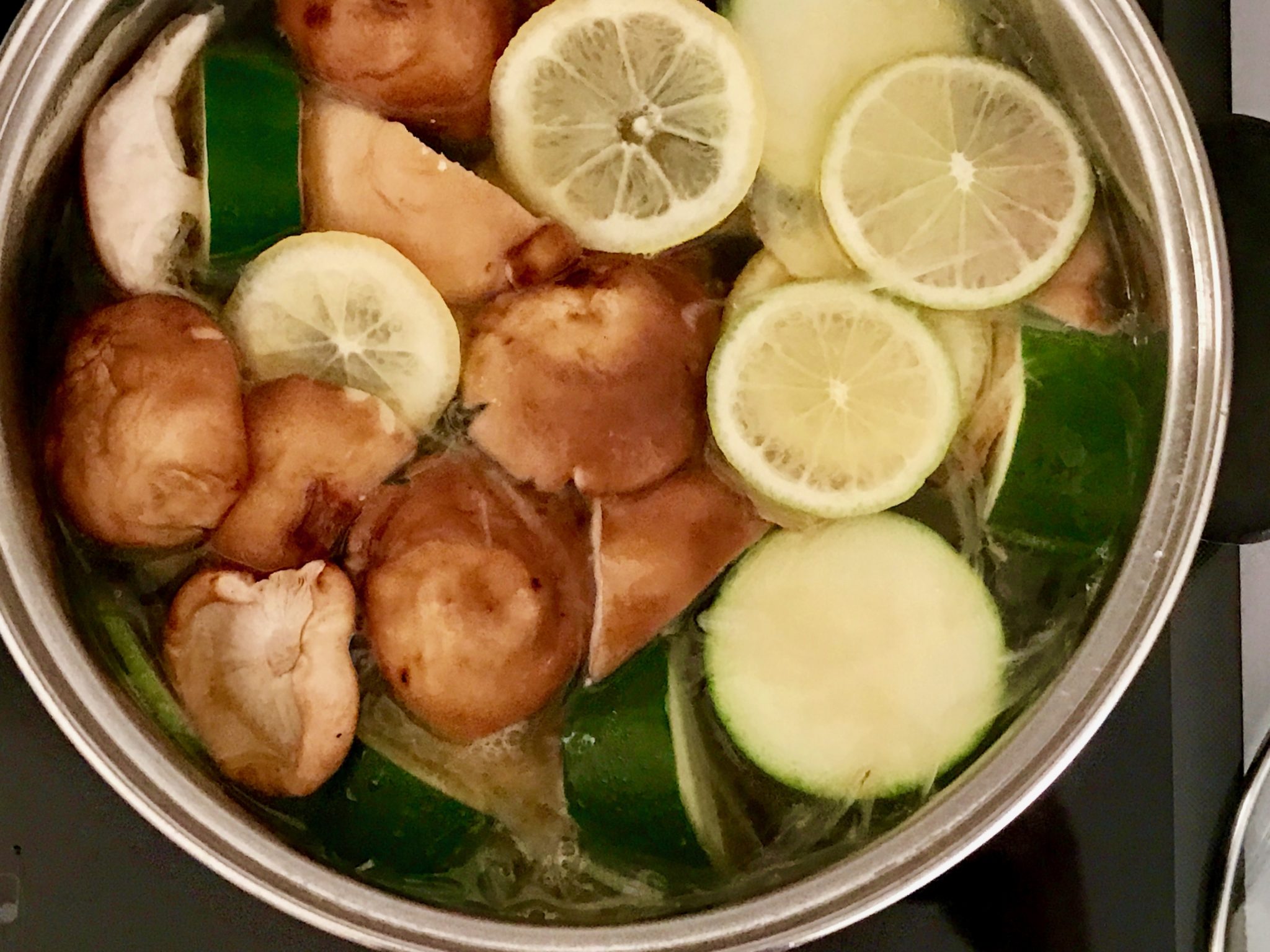 vegetables being cooked with lemon & lime