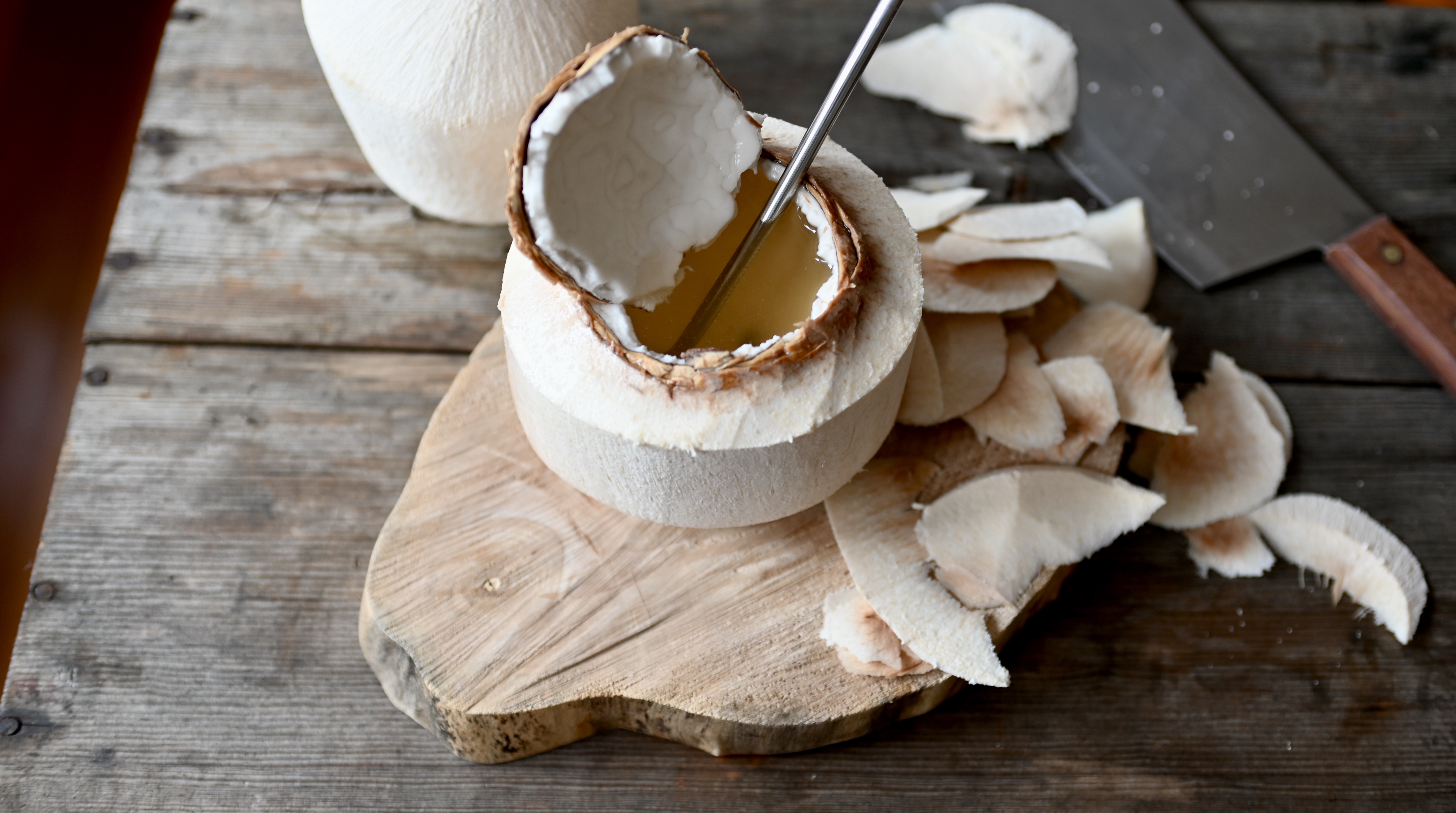 drinking young coconut water at home