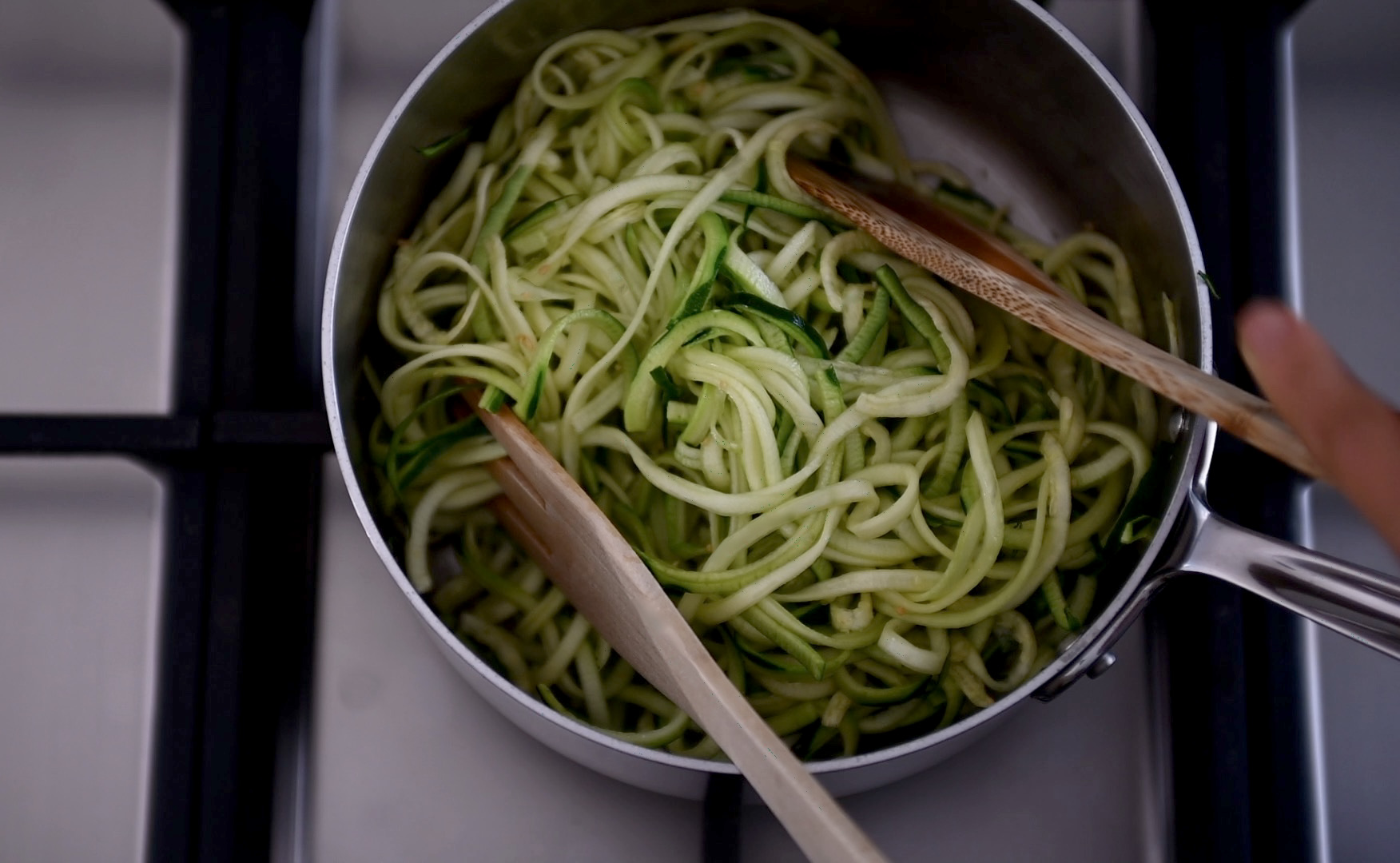 quick sauté the zoodles with garlic
