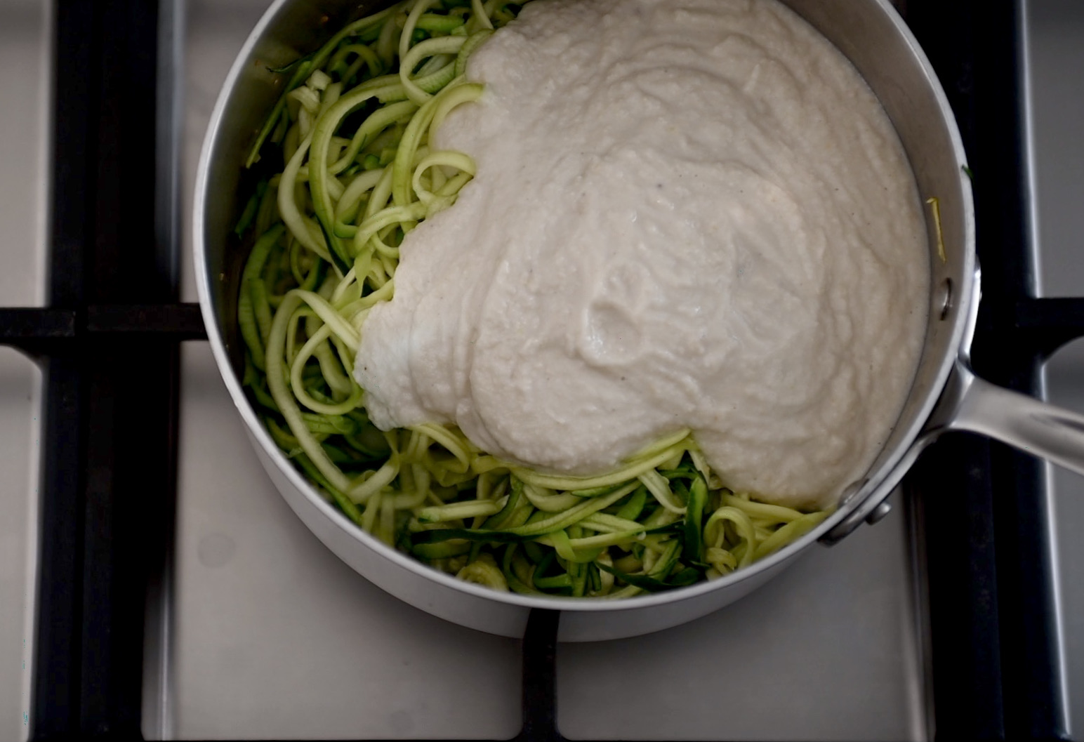 add the vegan Alfredo Sauce to the zoodles